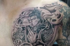Chinese Man Chest Tattoo