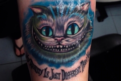 Chesire Cat Smile Tattoo