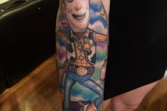 Toy story woody tattoo