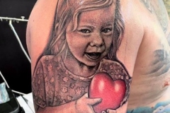 Arm Portrait Tattoo