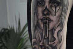 Lady arm tattoo