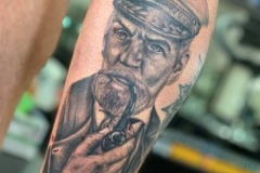 Old man portrait tattoo