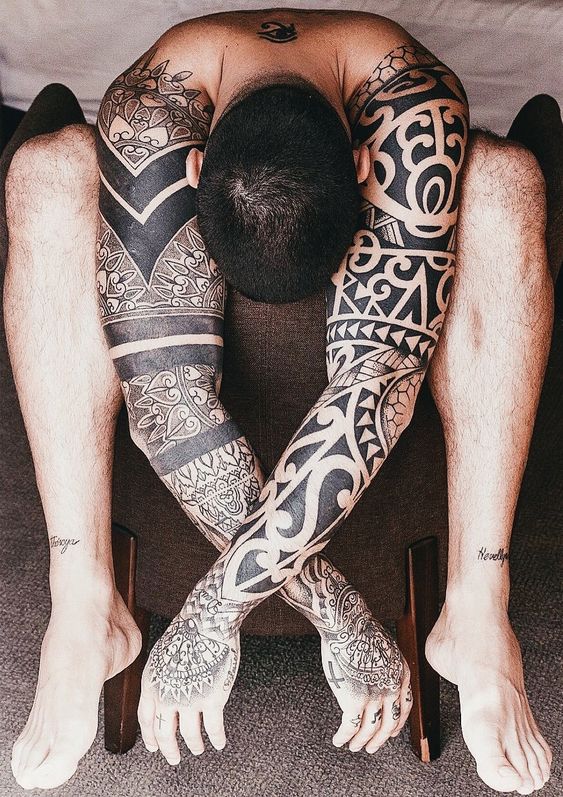 Tribal Design Sleeve Tattoo