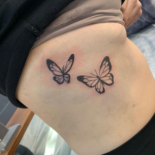 butterfly rib tattoo