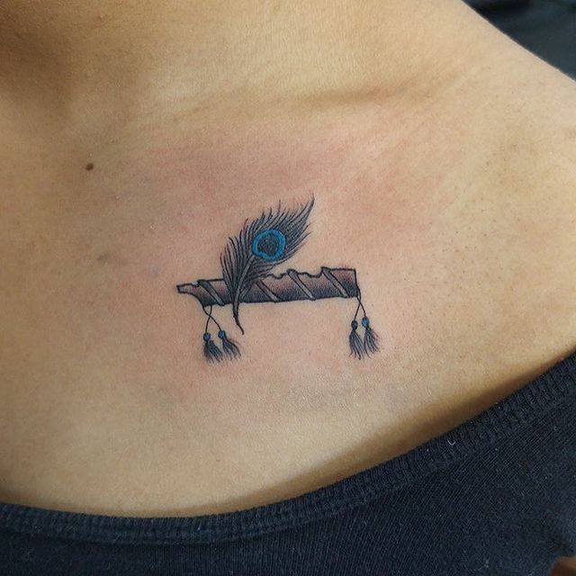 Flute and Flower tattoo