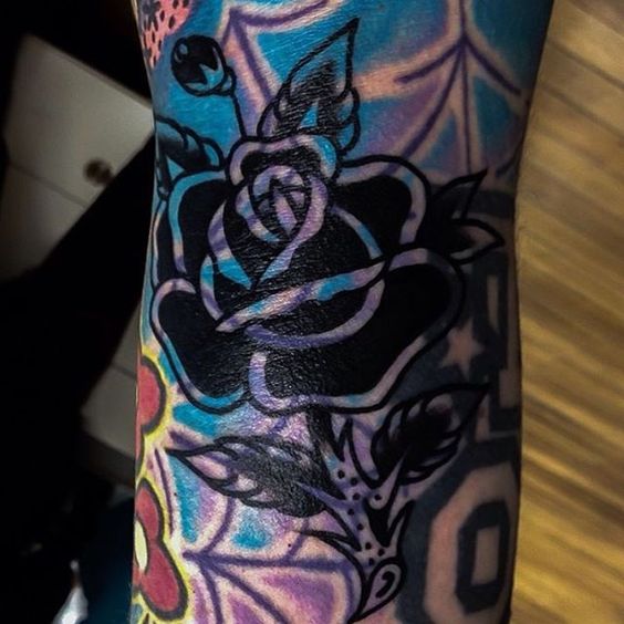 blast over rose tattoo