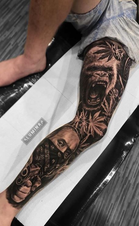 upper leg tattoos for men