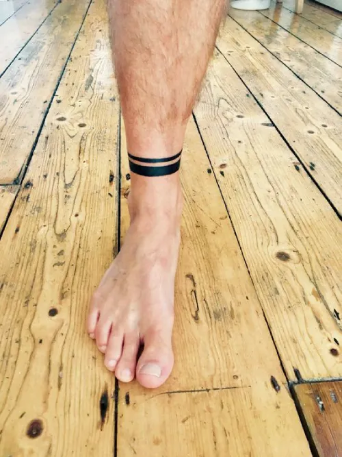 band tattoo on leg