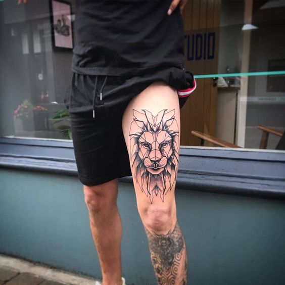 upper leg tattoos for men