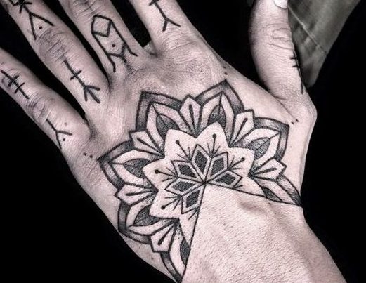 Symbolism Hand Tattoo